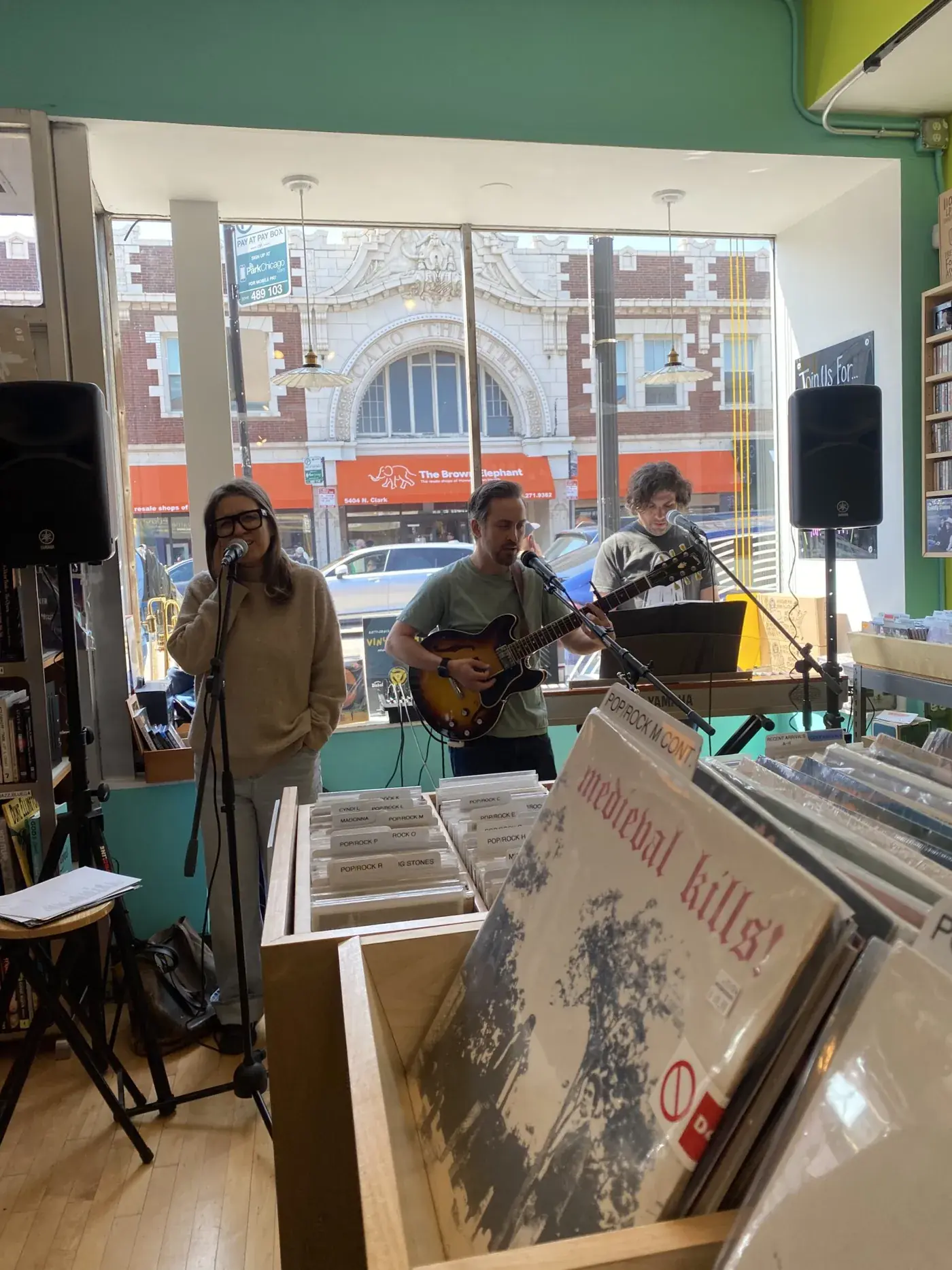 Estate Sale playing an acoustic set inside a Chicago record store